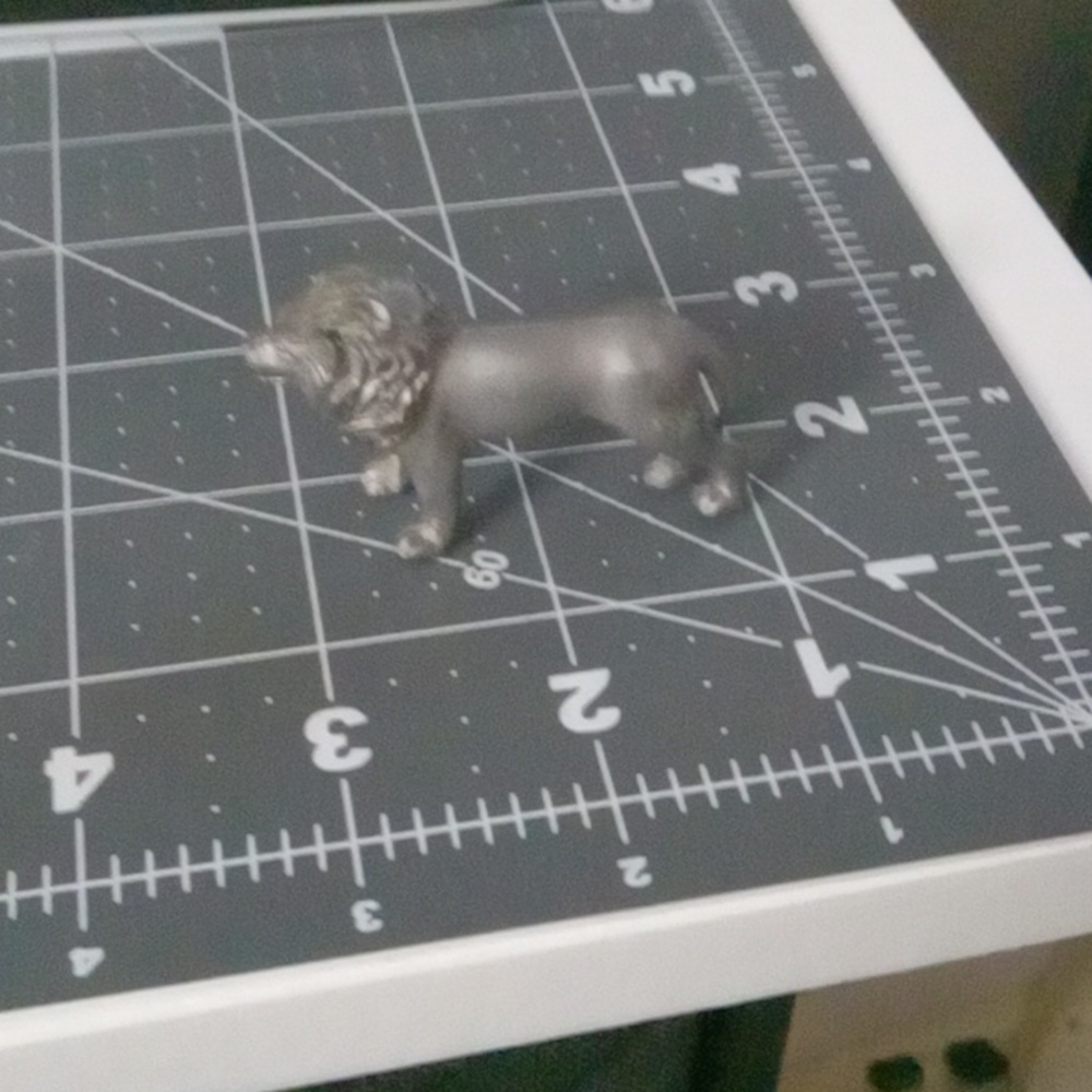 Small metal lion